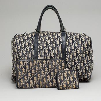 CHRISTIAN DIOR, kuvertväska, plånbok samt weekendbag.