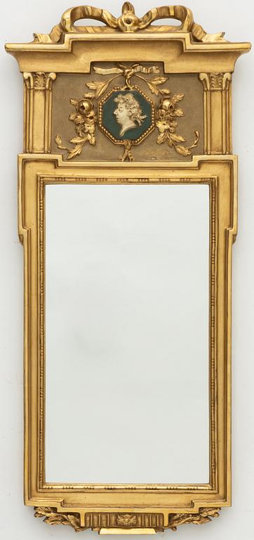 A Gustavian style mirror, mid-20th century.