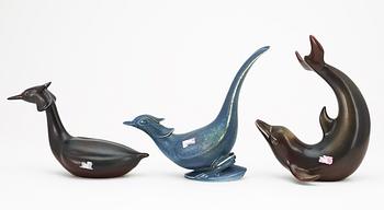 Three Gunnar Nylund stoneware figures, a dolphin, a pheasant and a great crested grebe, Rörstrand.