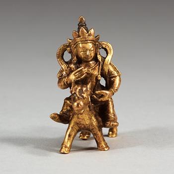 A gilt bronze figure of a Boddhisatva on a horse, Qing dynasty, 18/19th Century.