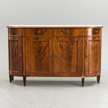 A 20th century marble top sideboard.