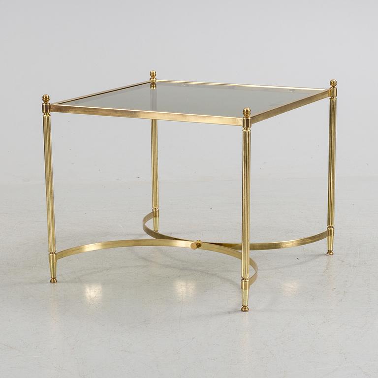 A brass and glass coffee table from the second half of the 20th century.
