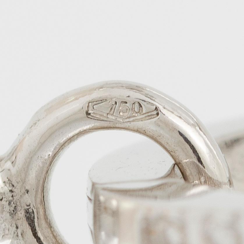 Earrings 14K white gold with cultured Akoya pearls and brilliant-cut diamonds.