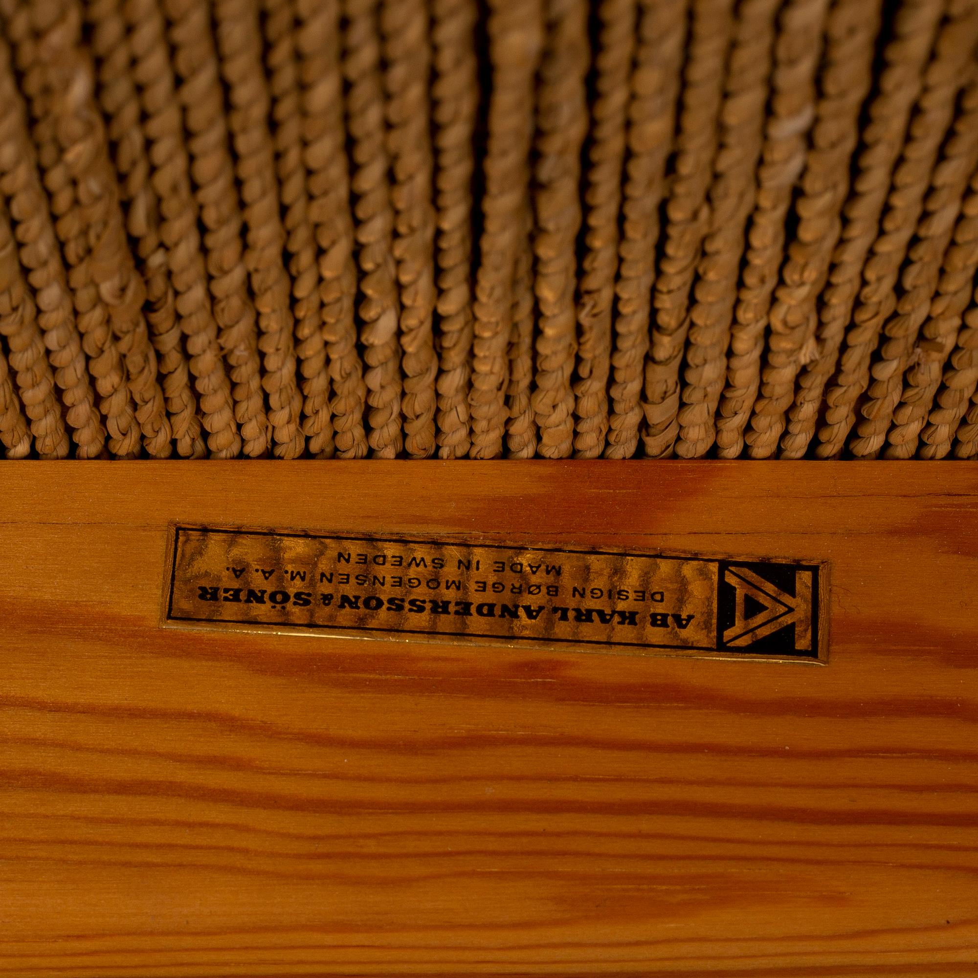 BØRGE MOGENSEN, a pine 'Asserbo' table and eight chairs from Karl Andersson & Söner.