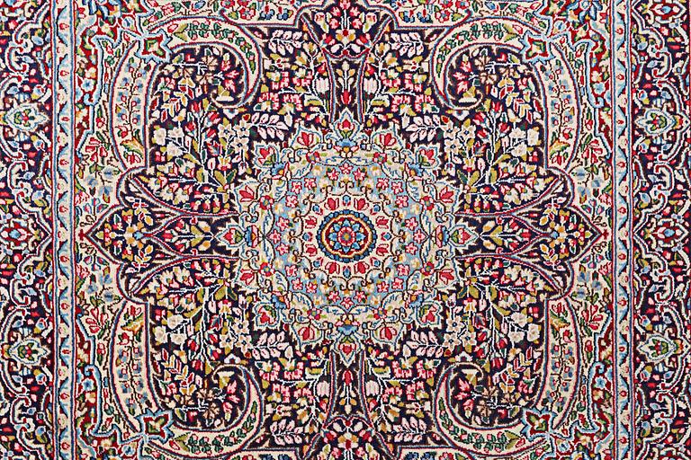 A Kerman rug, c. 149 x 147 cm.