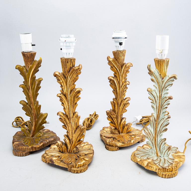 A set of four wood table lamps from Paoletti, Firenze Italy, second half of 20th century.