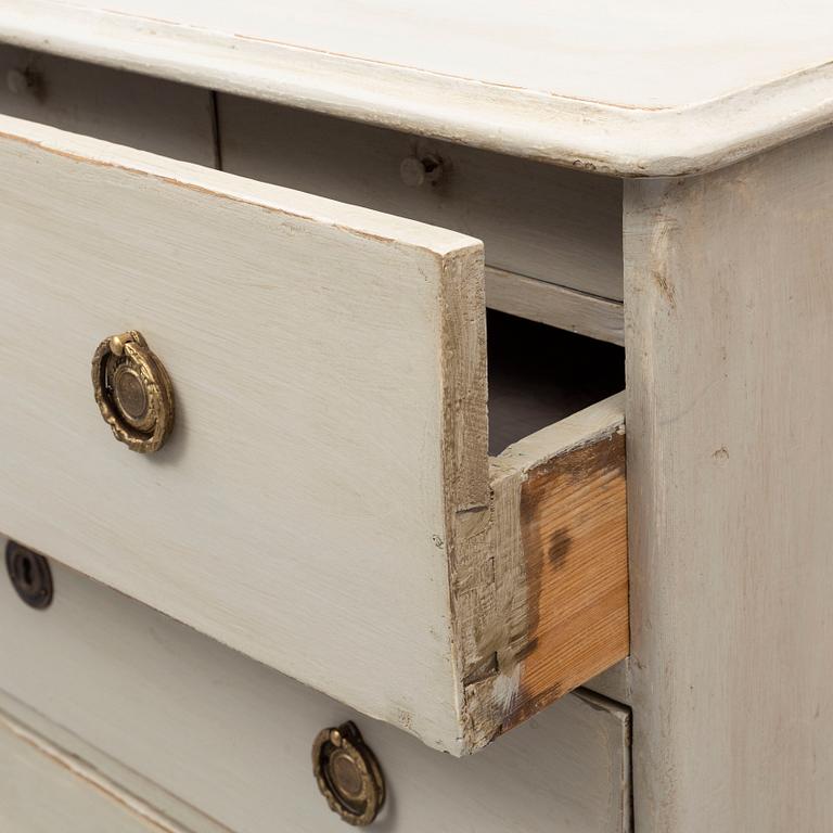 A mid 19th century painted chest of drawers.