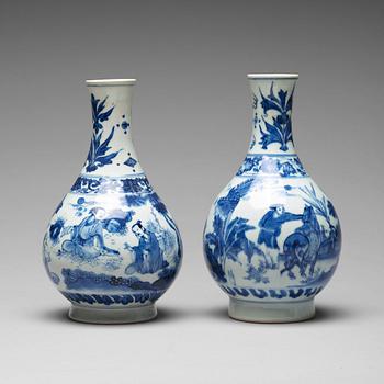 581. Two Transitional blue and white pear shaped vases, 17th Century.