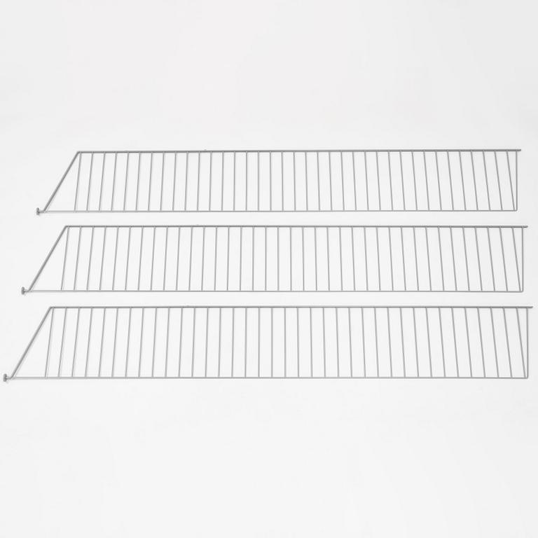 A 'String' shelving system by Nils Strinning, with three sides and 12 shelves.