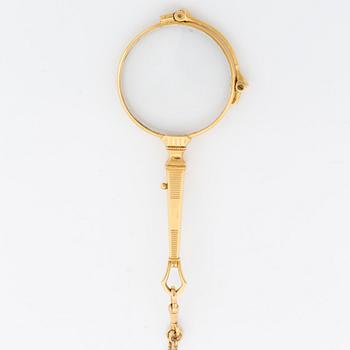 18K gold lornet.