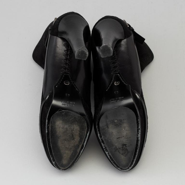 Black suede bootie by Ralph Lauren.