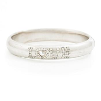 557. Chopard armband 18K vitguld med runda briljantslipade diamanter "Happy diamonds".