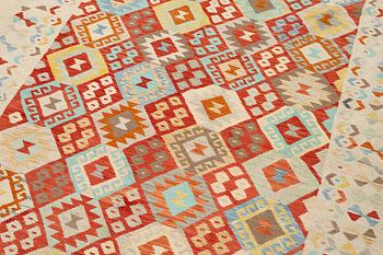 A Kilim carpet. ca 295 x 208 cm.