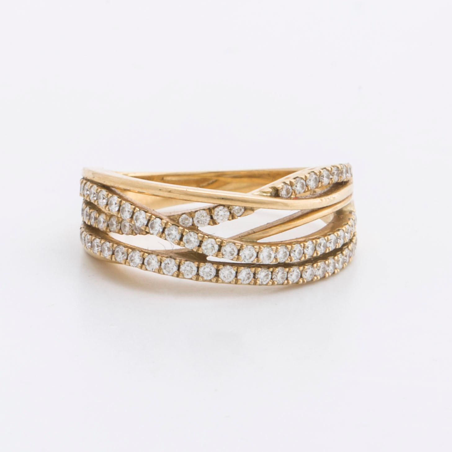 RING 18K guld m briljanter ca 0,40 ct totalt.