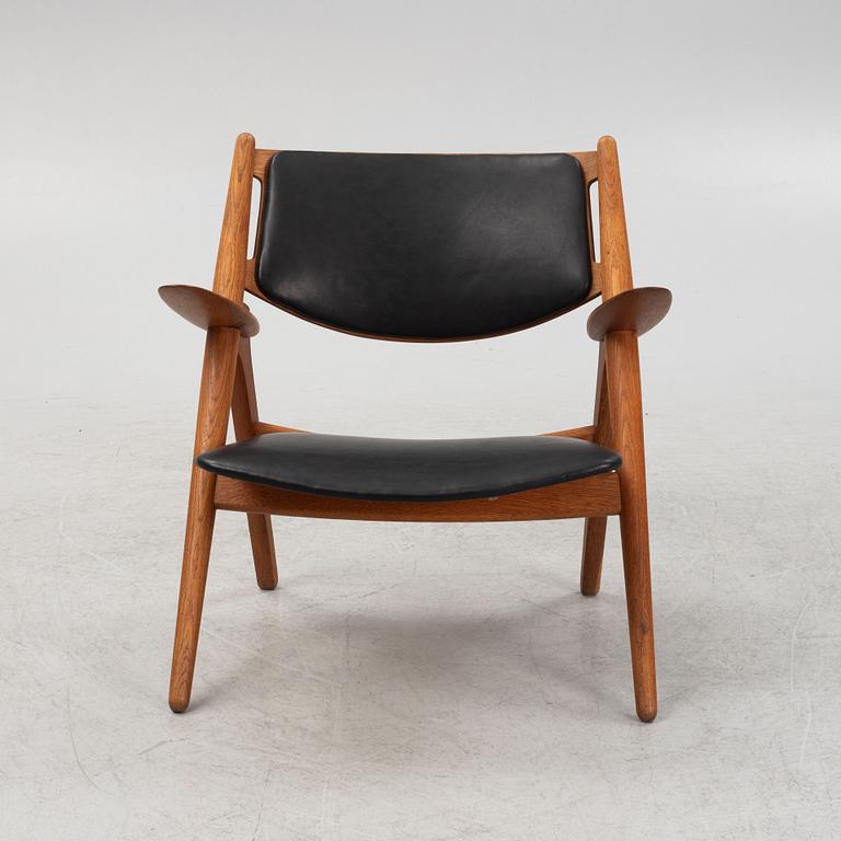 A Hans J. Wegner "CH28" armchair, Carl Hansen, Denmark, second half of the 20th century.