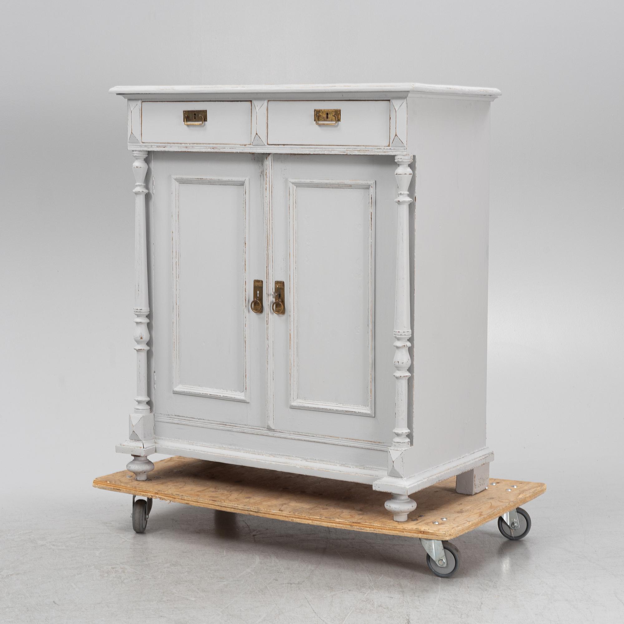 A painted cabinet, late 19th Century.