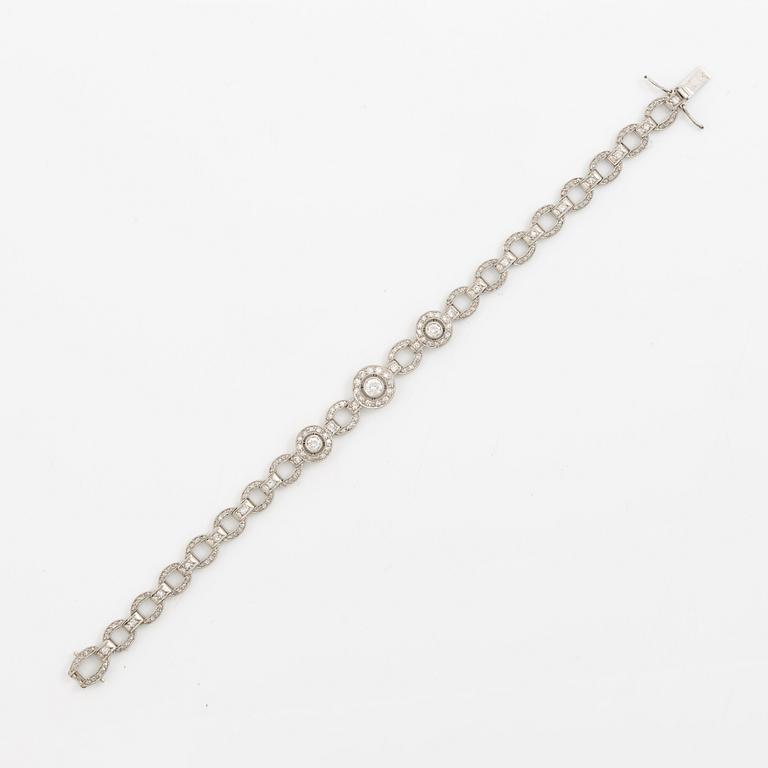 Bracelet in platinum set with round brilliant, octagonal, and rose-cut diamonds.