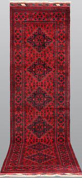 An Afghan runner, approx. 286 x 84 cm.