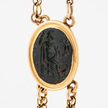 An 18K gold and hardstone intaglio necklace, 19th century.