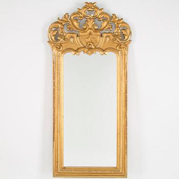 A late 19th century rococo style mirror.