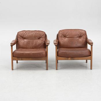 A pair of 1970's armchairs.