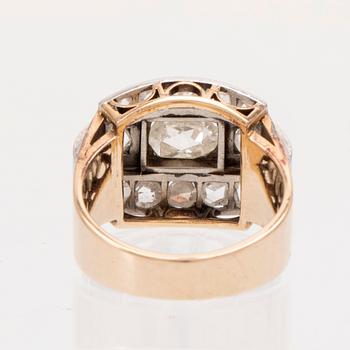An 18K white and red gold ring set with rose cut diamonds.