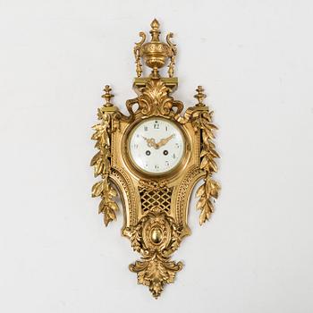 A first half of the 20th century brass wall clock.