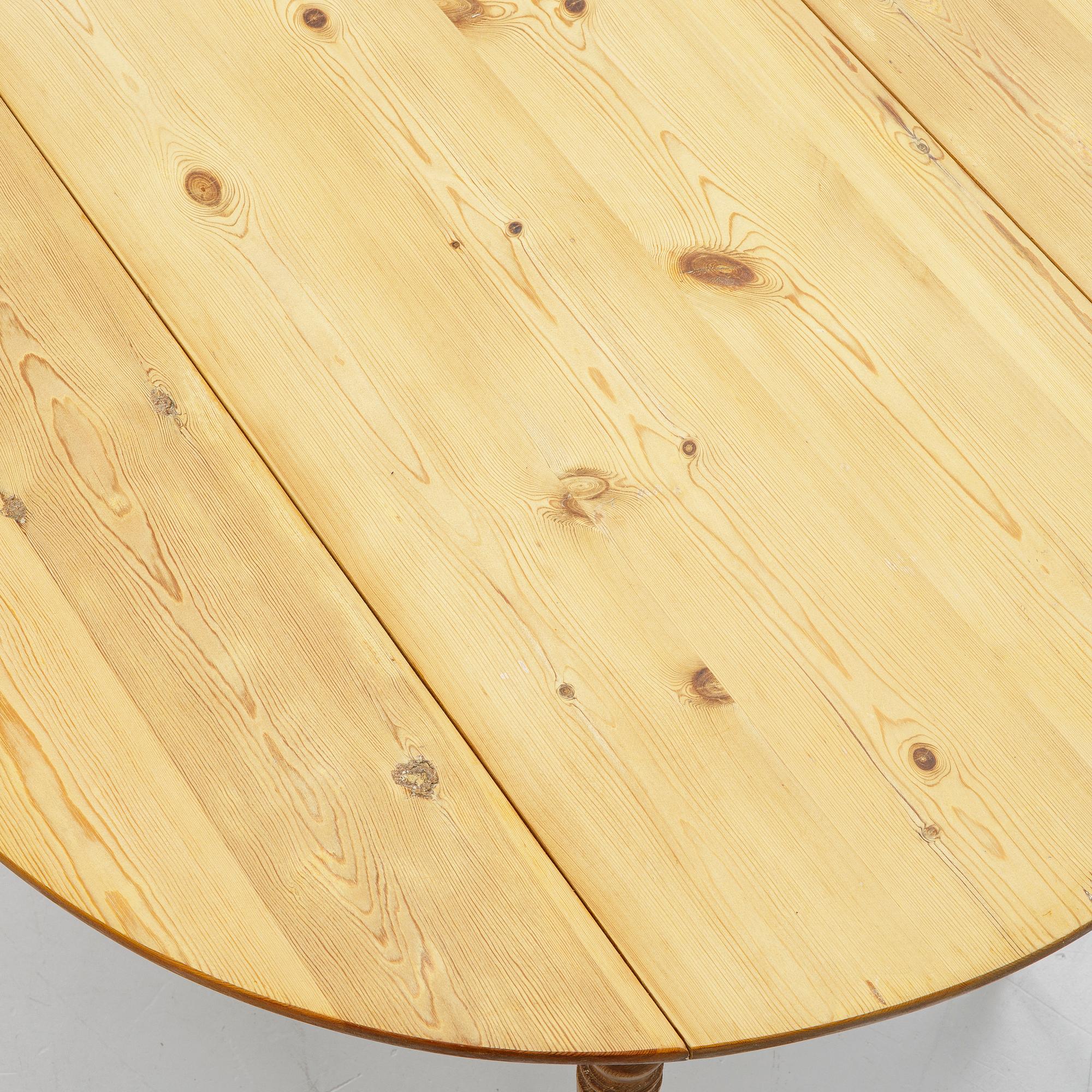 A folding table, early 20th Century.