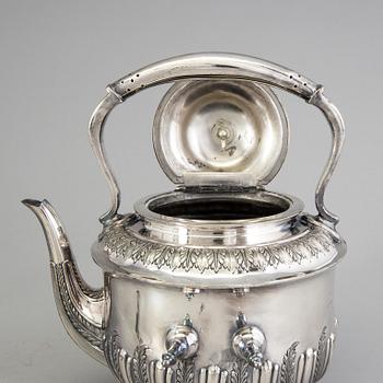 A 20th century tea pot on stand by Walker & Hall, Sheffield, England.