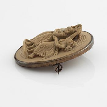 Armband och brosch med lavacaméer.