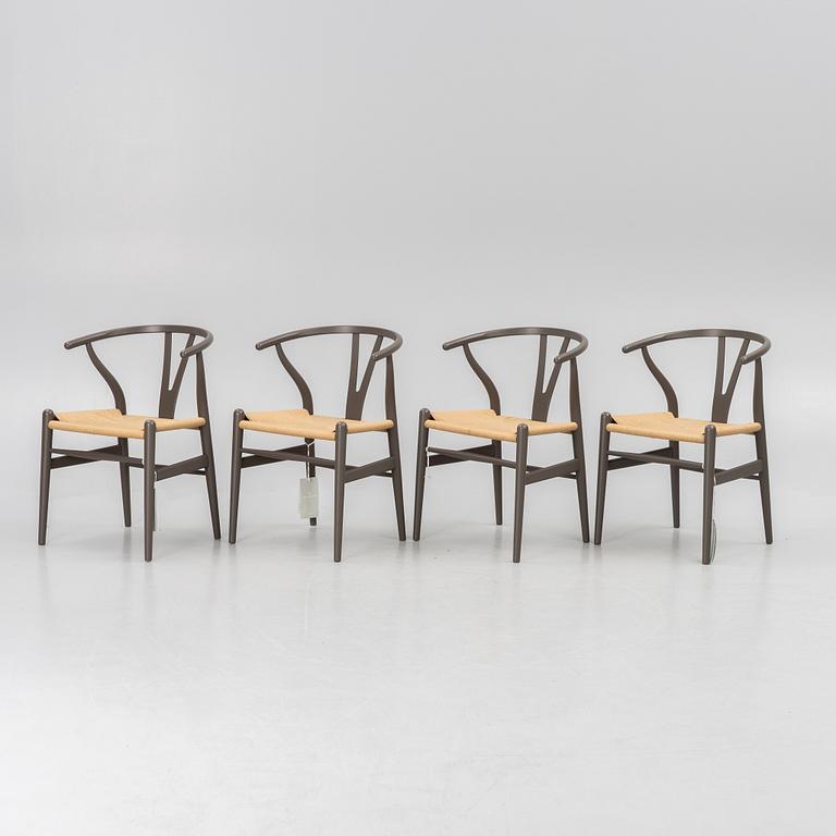 Hans J. Wegner, four CH 24 chairs, Carl Hansen & Son, Denmark.