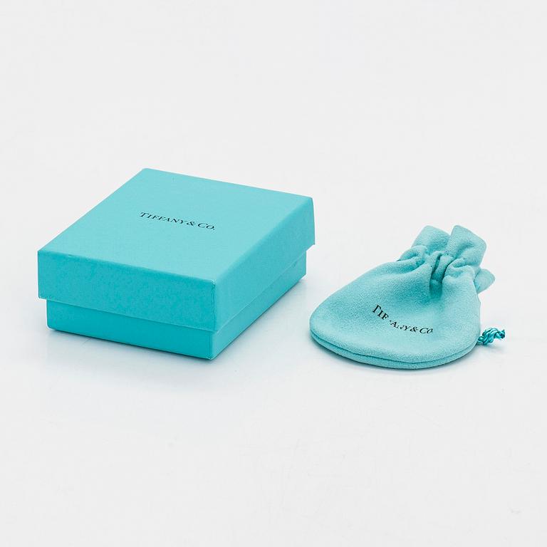 Tiffany & Co, Paloma Picasso, "Melody" hoop earrings in 18K gold.