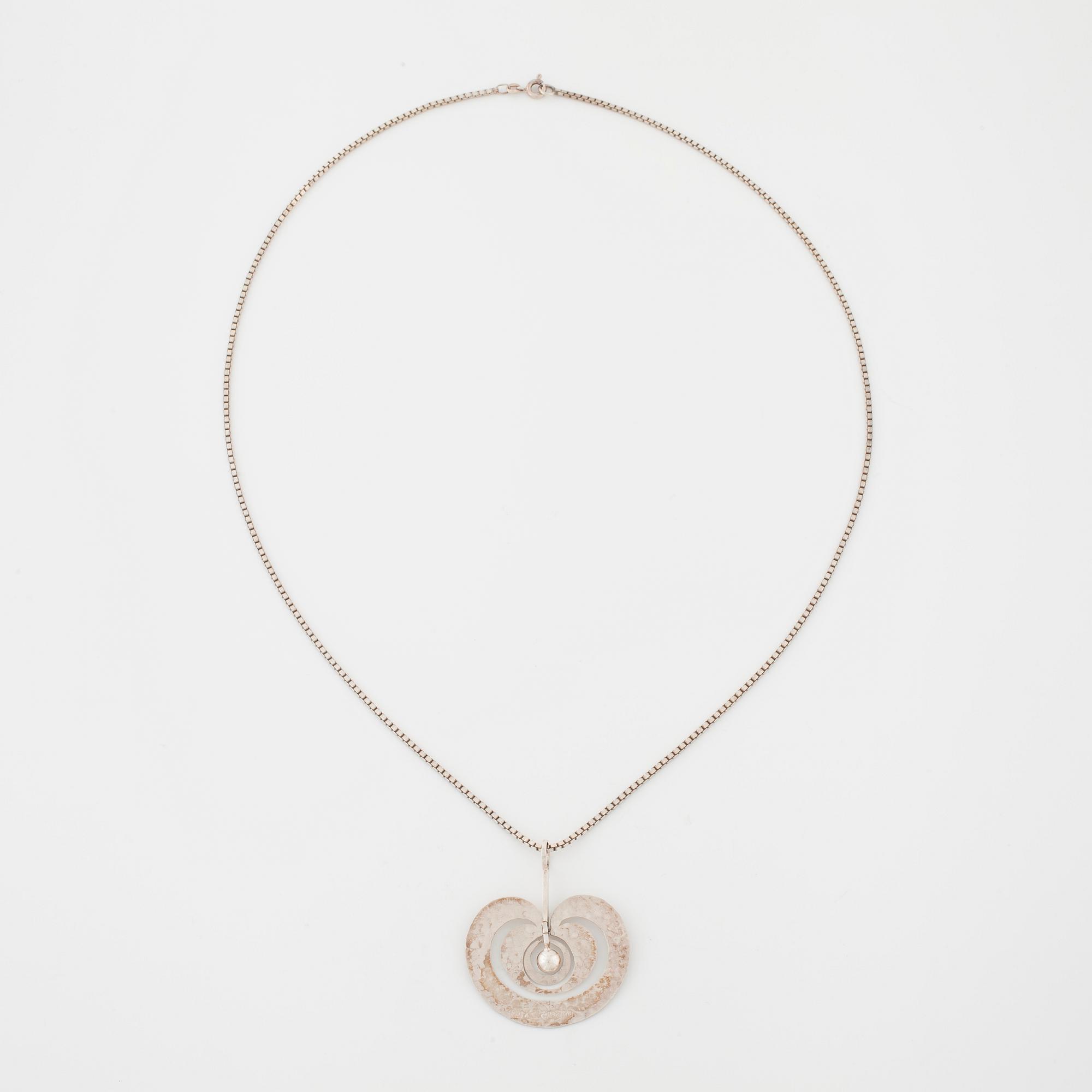 TAPIO WIRKKALA, Kultakeskus 1975, a "Omena" (Apple) pendant.