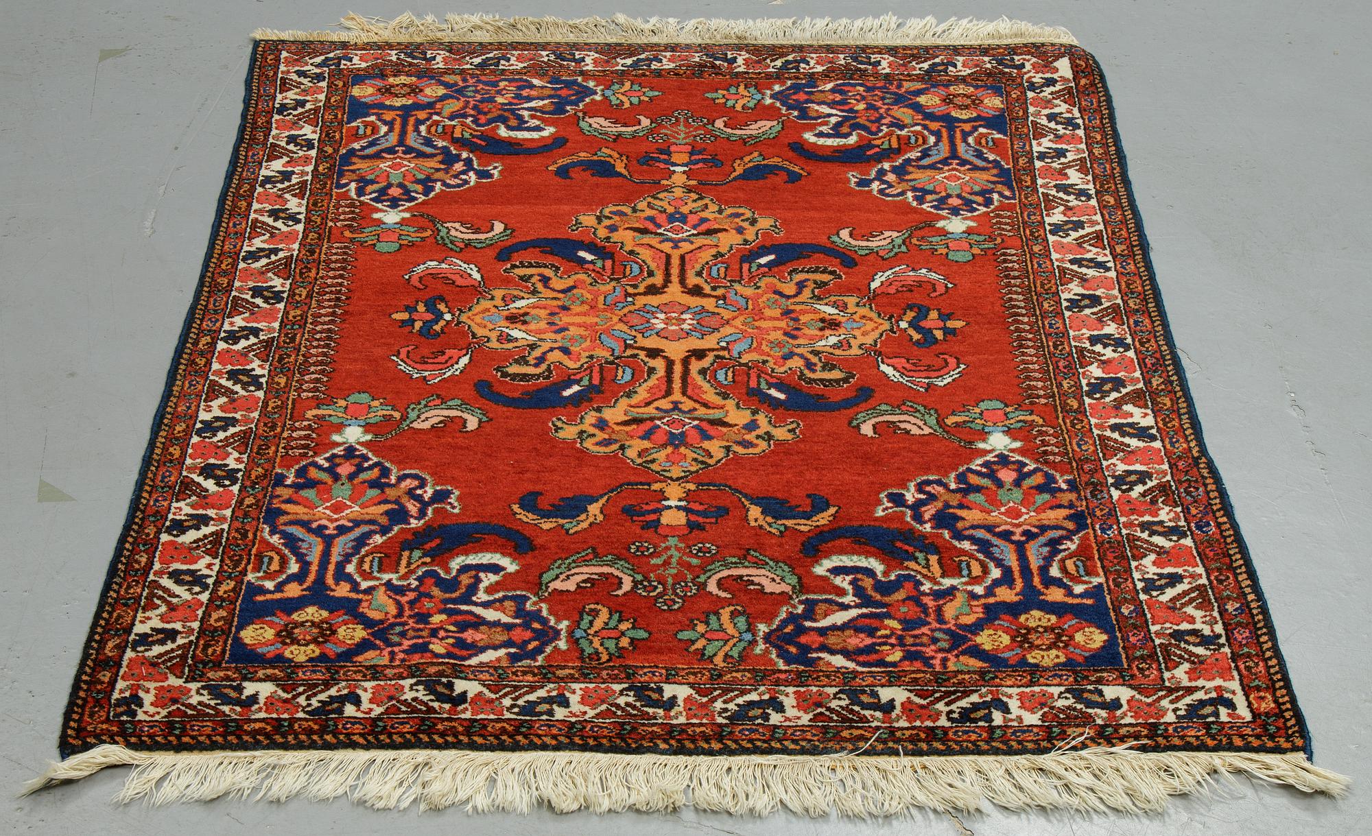 A rug, semi-antique Hamadan, ca 140 x 110 cm.