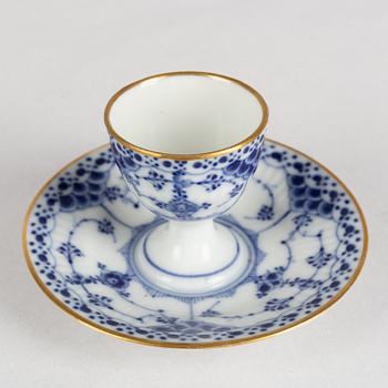 A 'Blue Fluted' porcelain egg stand and a pair of small dishes, Royal Copenhagen, model 543 and 1004, 20th century.