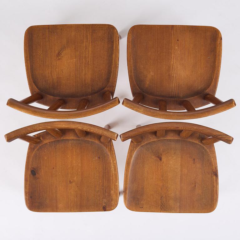 Axel Einar Hjorth, a set of four stained pine "Utö" chairs, Nordiska Kompaniet, Sweden, 1930s.