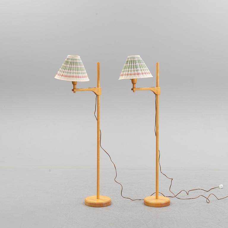 CARL MALMSTEN, a pair of birch 'Staken' standard lights.