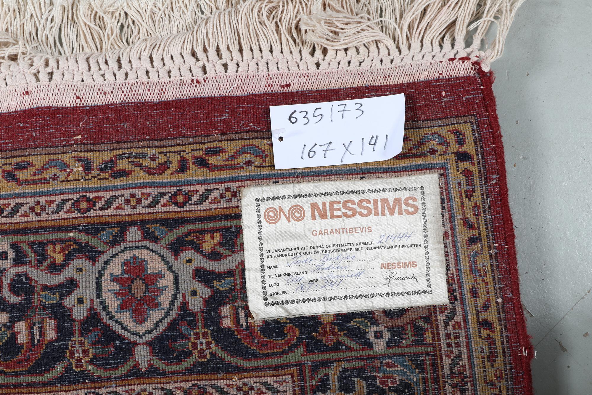 A rug, Tabriz, ca 241 x 167 cm.