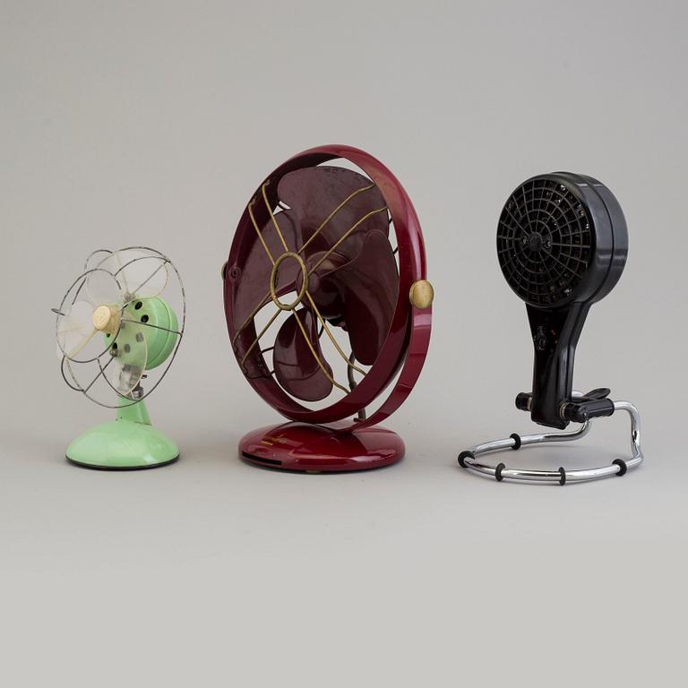 a set of three plastic and bakelite fans, mid 20th century.