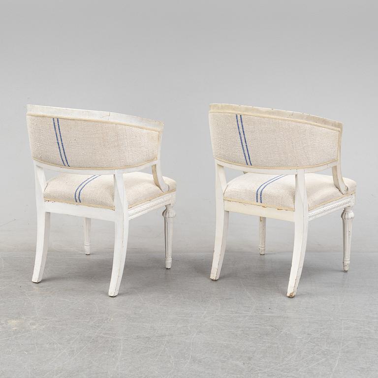 A pair of Gustavian style armchairs from around year 1900.