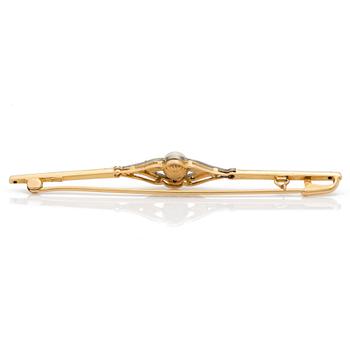A bar brooch set with a cultured pearl and diamonds.