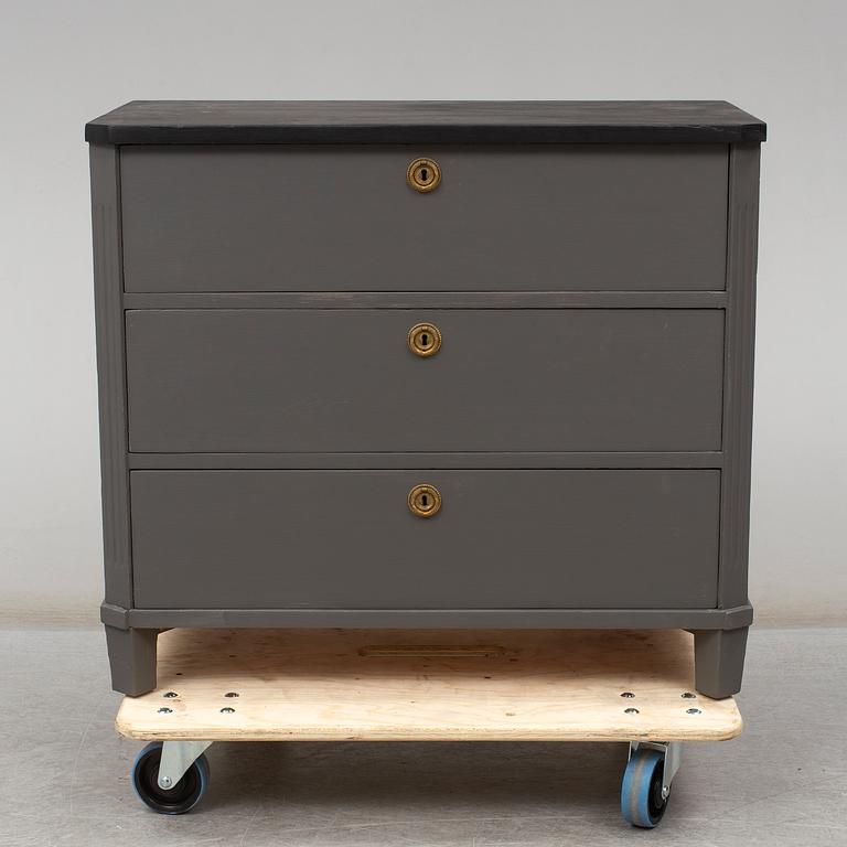 a mid 20th century gustavian style chest of drawers.