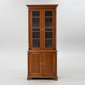 A pine cabinet, later part of the 19th Century.