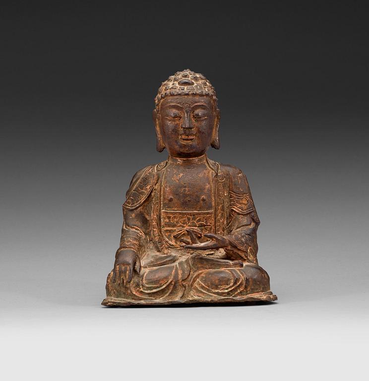 A bronze figure of a seated Buddha, Ming dynasty (1368-1644).