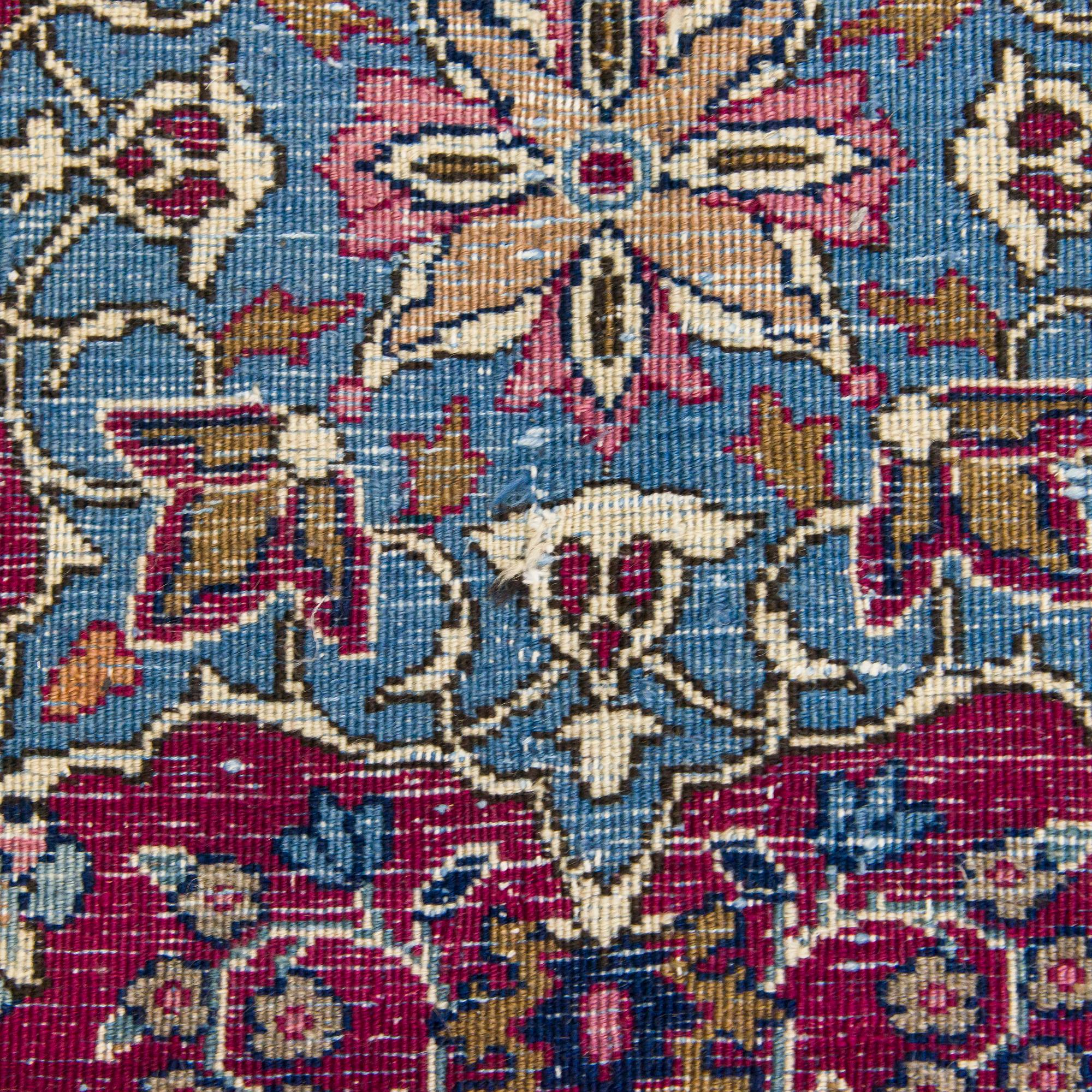 A Meshed rug, old, 380 x 300 cm.