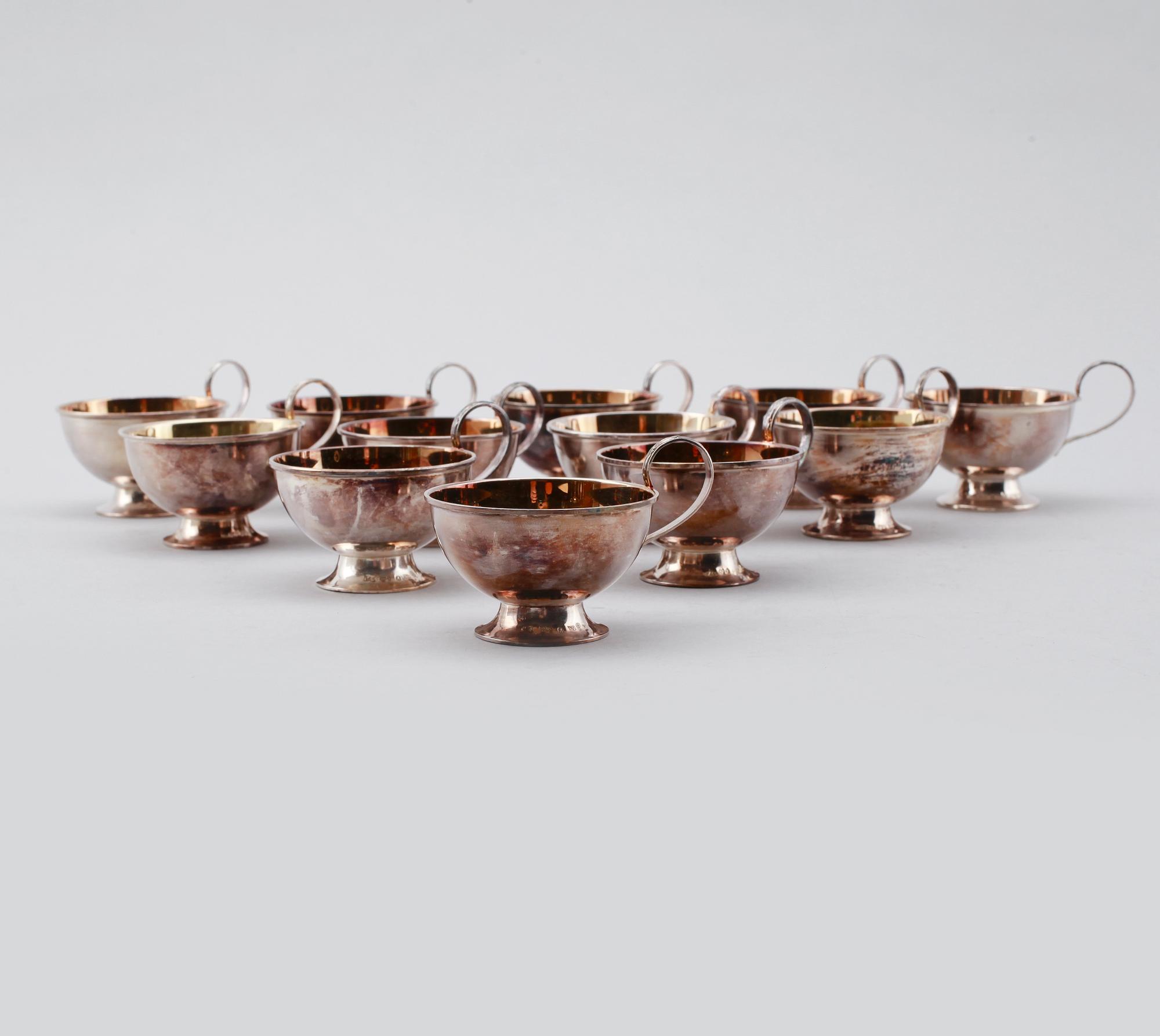 PUNCHMUGGAR, 12 st, silver, GAB, 1950-tal. Vikt ca 405 gram.