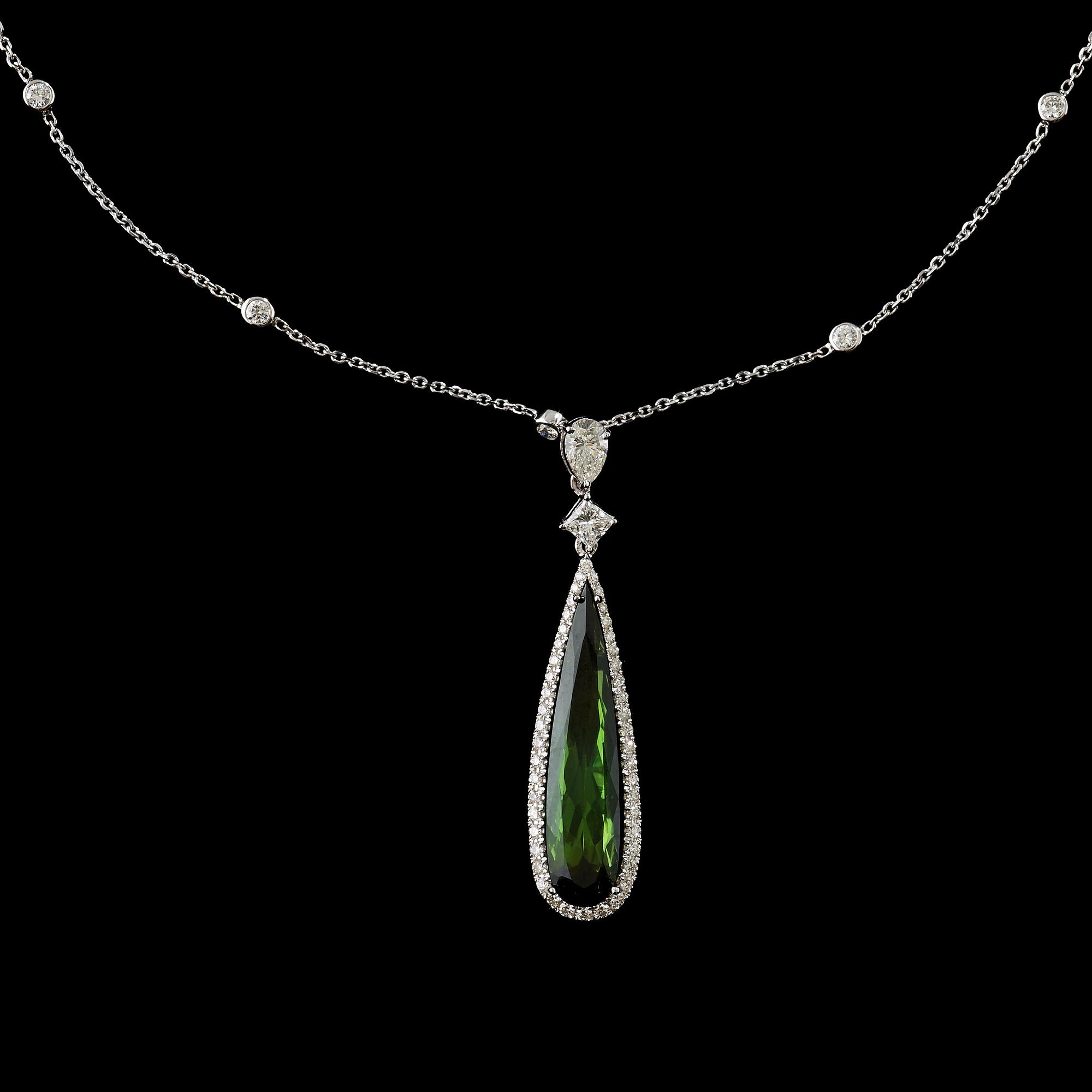 A tourmaline, circa 5.08 cts, and diamond, circa 1.30 cts, necklace.