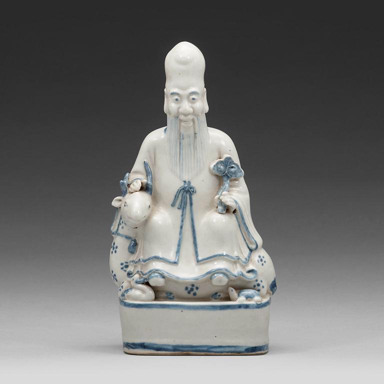 A blue and white figurine of a Chinese Immortal sitting on his deer, Ming dynasty (1368-1644).