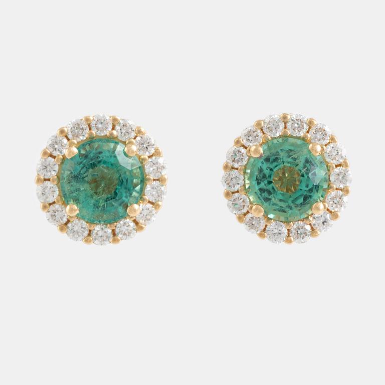 Emerald and brilliant cut diamond earrings.