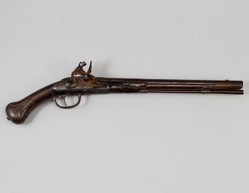A Danish flint lock pistol signed, (Paul Nielsen Norrman, ca 1700).